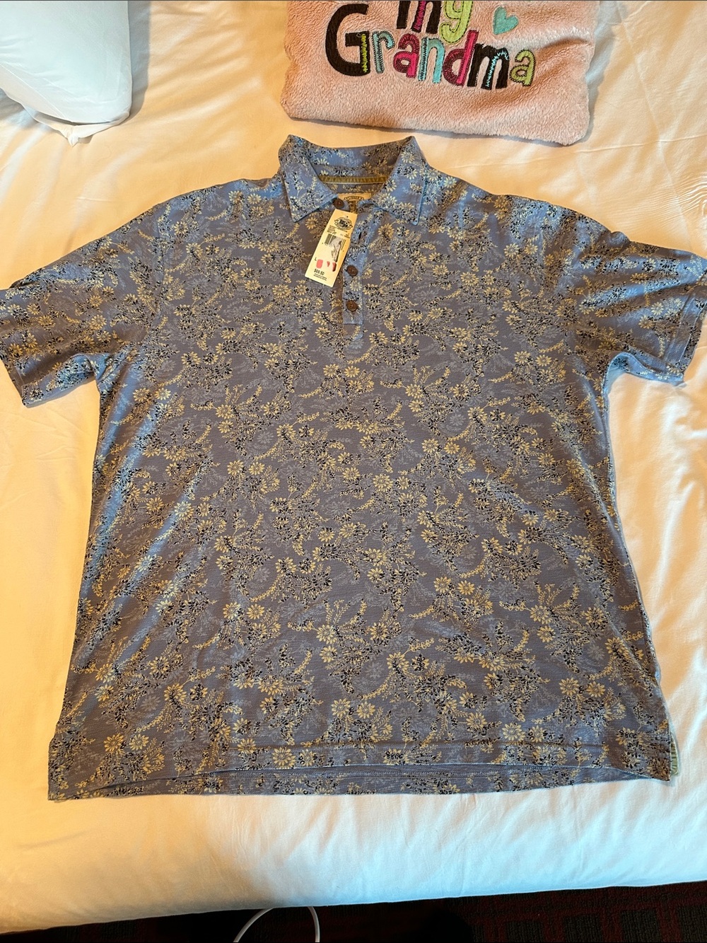 Men's Light Blue Floral Polo Shirt with Subtle Print